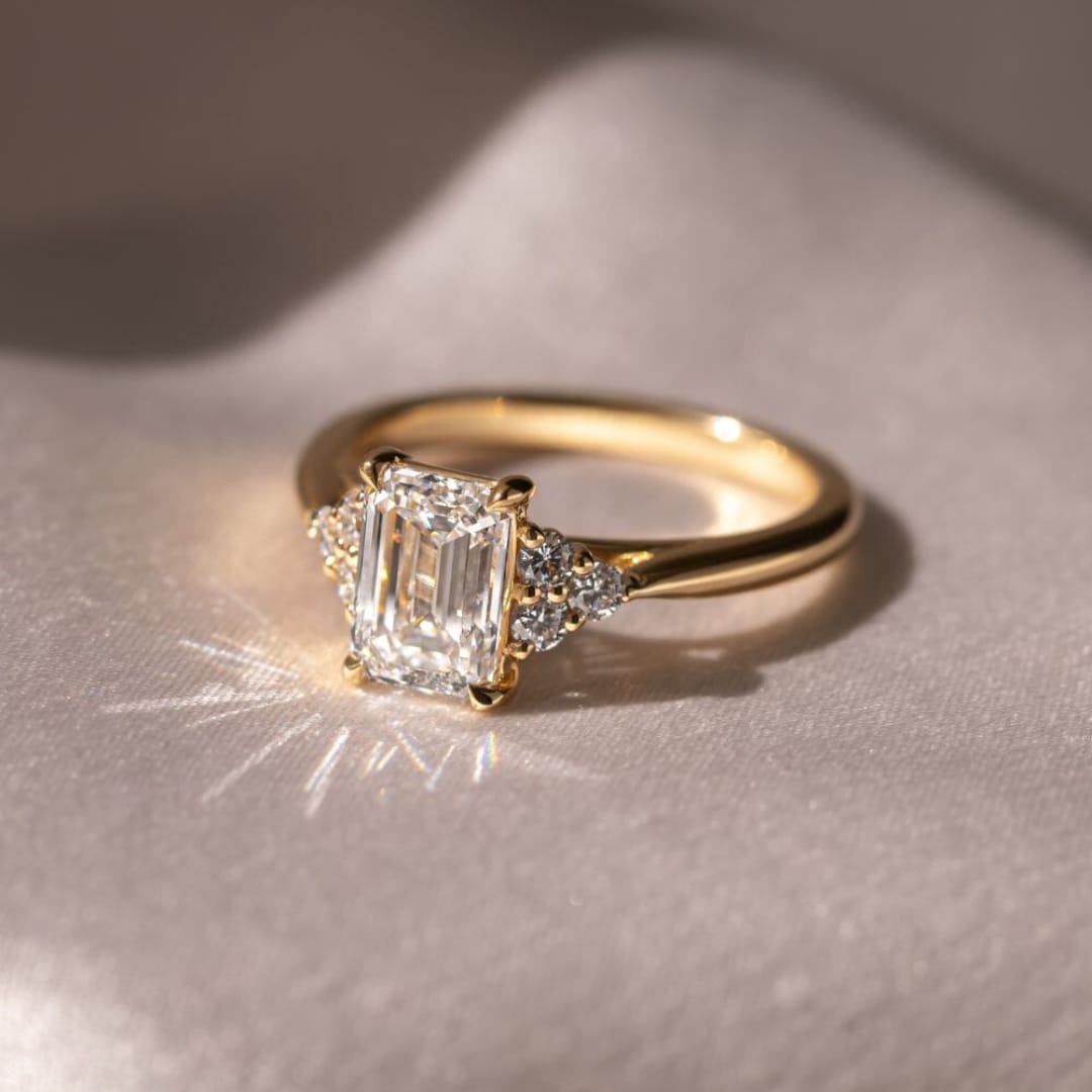 Emerald and Gold Engagement Ring: A Timeless Sign of Devotion
